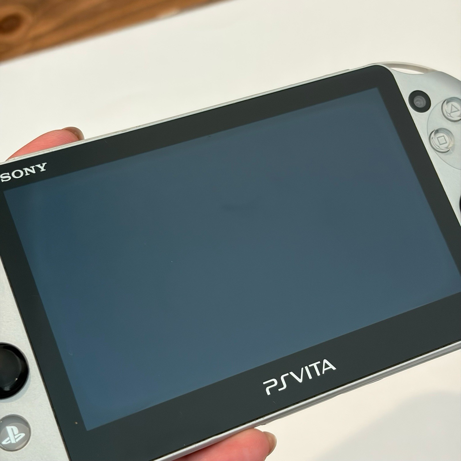SONY PS Vita PCH-2000 Console Silver Very Good Fast Shipping No joystick drift.
