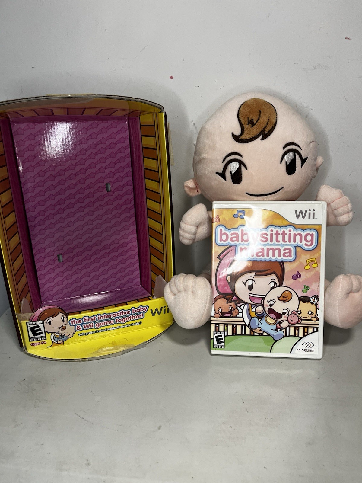 Majesco Babysitting Mama Nintendo Wii 2008 Manual Included w/ Baby Doll