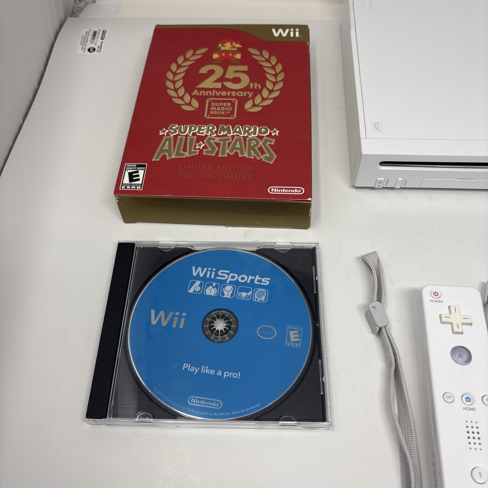 Nintendo Wii Console Bundle w/ 2 Remotes – 2 Nunchuks – Wii Sports – Mario