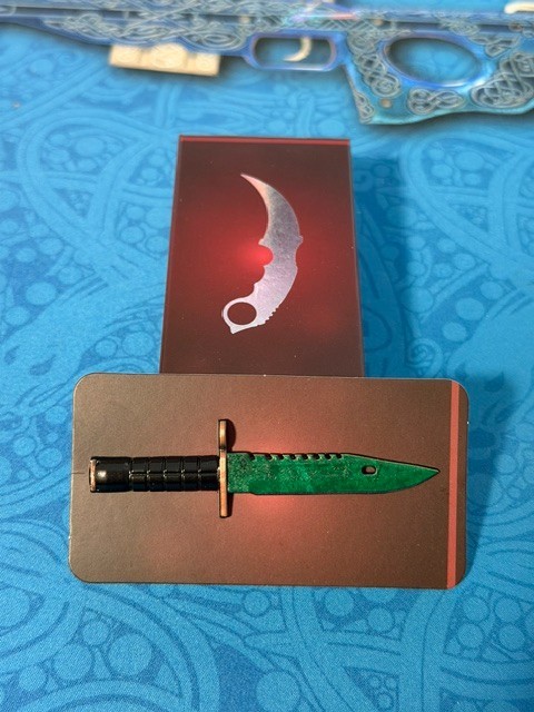 Set of all 12 Knife Pins Counter-Strike 2 Perfect World China – Valve Licensed
