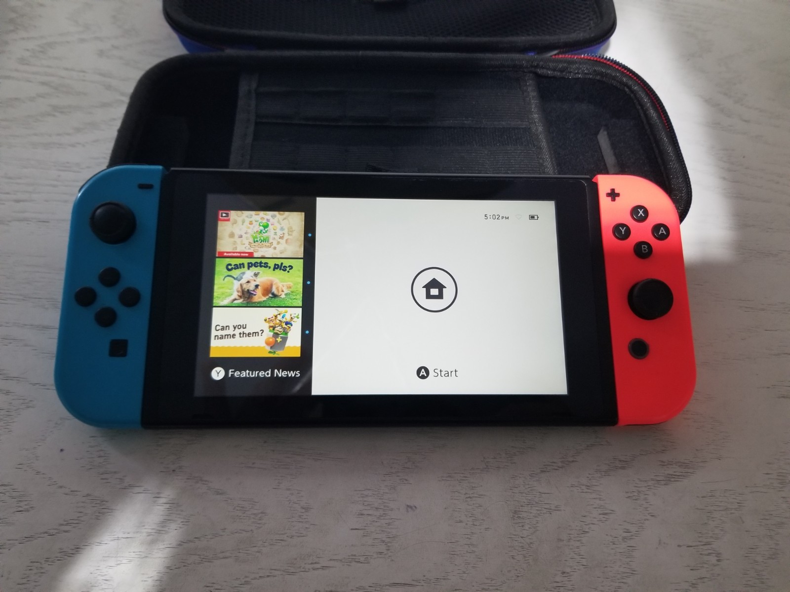 Nintendo Switch with Neon Blue and Neon Red Joy-Con (HAC-001-01) With Case