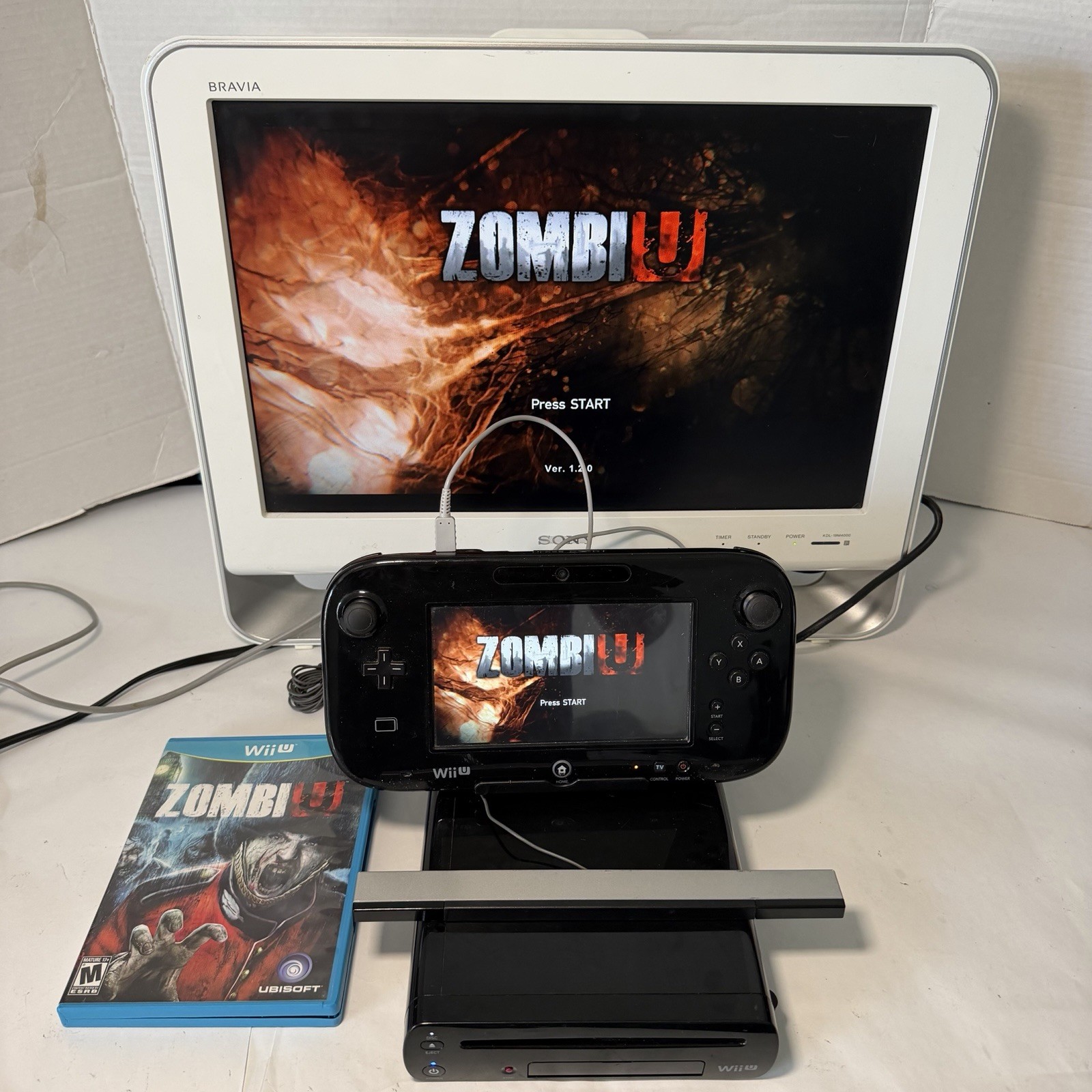 Nintendo Wii U 32GB Black Deluxe Console & Gamepad W/ Mario Kart 8 And Zombie U