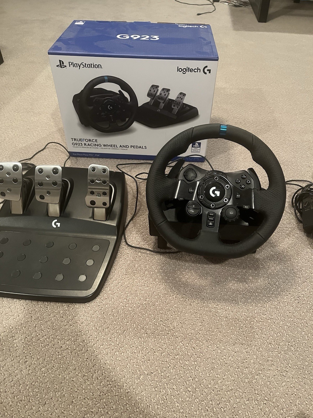 Logitech G923 Racing Wheel with Pedals, feels brand new.