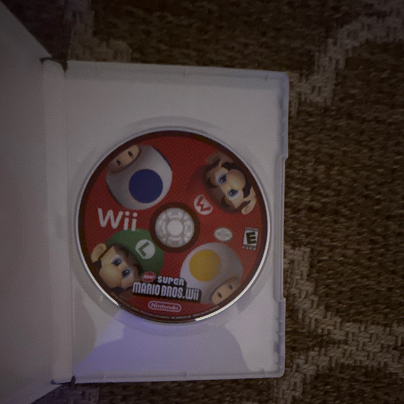 New Super Mario Bros. Wii Nintendo Wii Game Multiplayer E 2009 NTSC-U/C