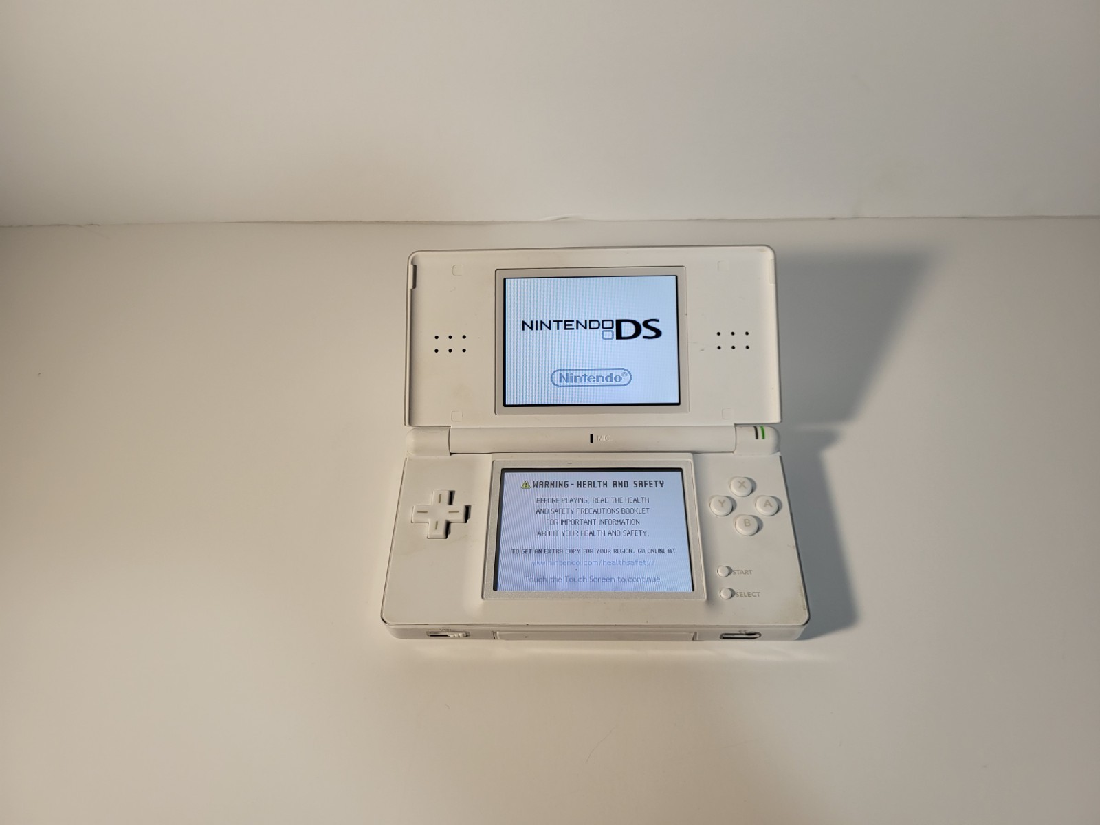 Nintendo DS Lite Handheld with Charger and Mario Bros USG-001 FULLY WORKING