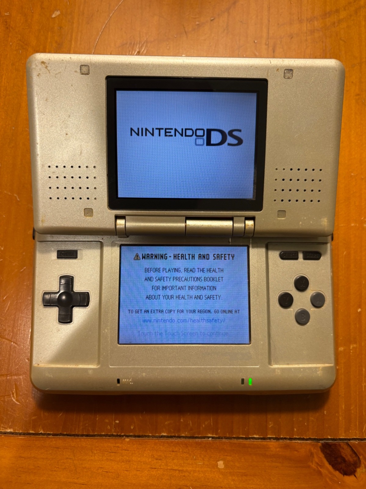 Nintendo DS Silver Handheld System – Fair Condition – TESTED AND WORKING (11D)