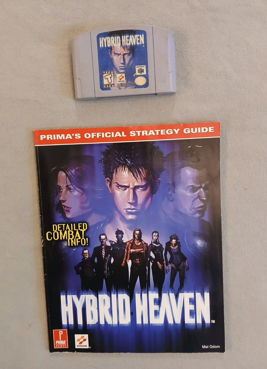 N64, Hybrid Heaven Game Cartridge & Prima Strategy Guide, Very Good Condition