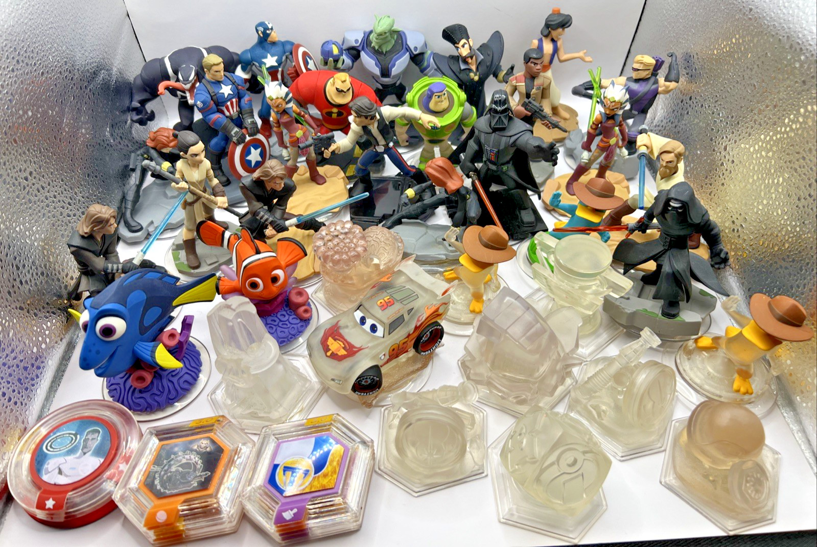 Disney Infinity lot of 50 figs & Pieces Star Wars Aladdin Cars Nemo venom Etc