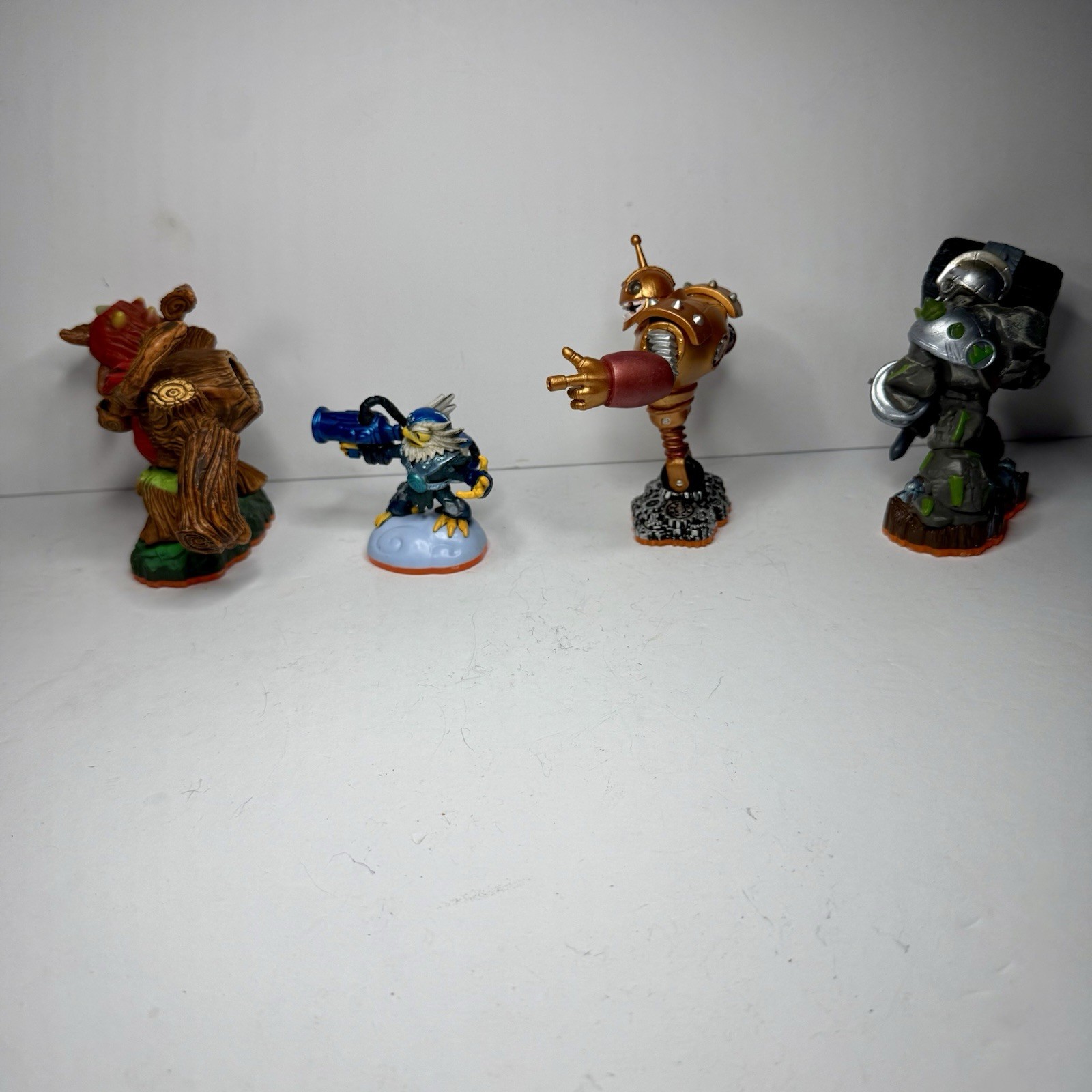Skylanders Giants Figure Lot Of 4 – Bouncer Jet Vac Crusher Tree Rex