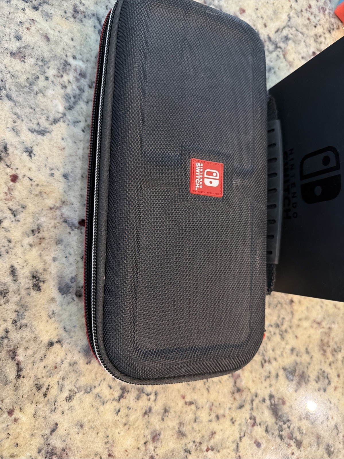 Nintendo Switch Gray Console with Orange and Neon Blue Joy-Con Charger Dock Case