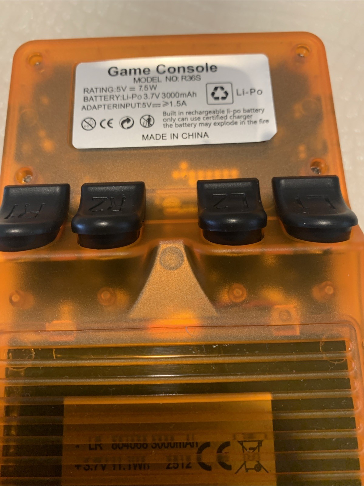 R36S Handheld Game Console 640×480 Quad-Core ARM 1GB RAM Purple 64 Gb TF Card