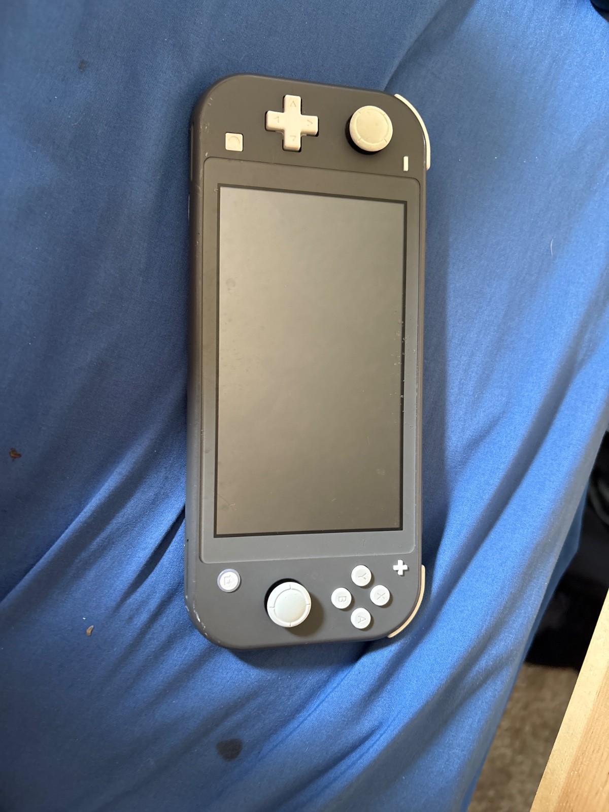 Nintendo Switch Lite 32GB Handheld System working every thing