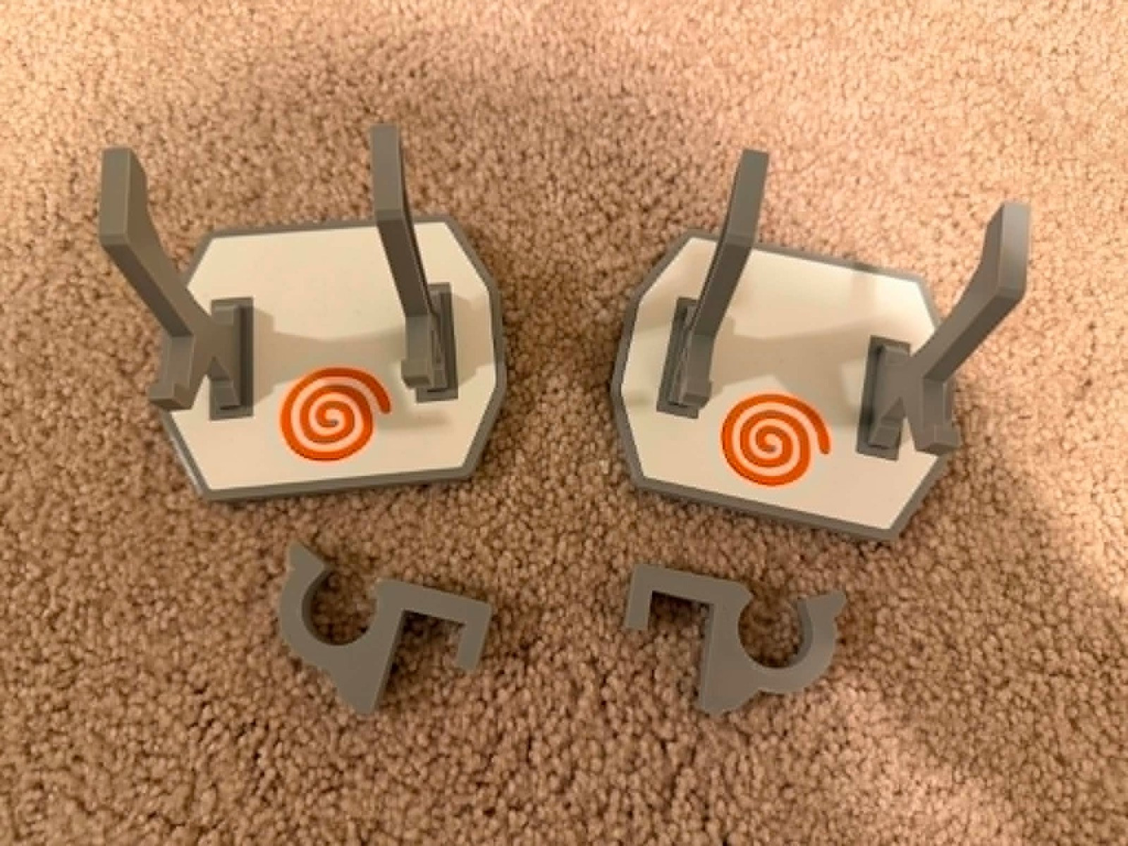Sega Dreamcast Controller Display Stands 3D Printed Pair Gray White Orange Swirl