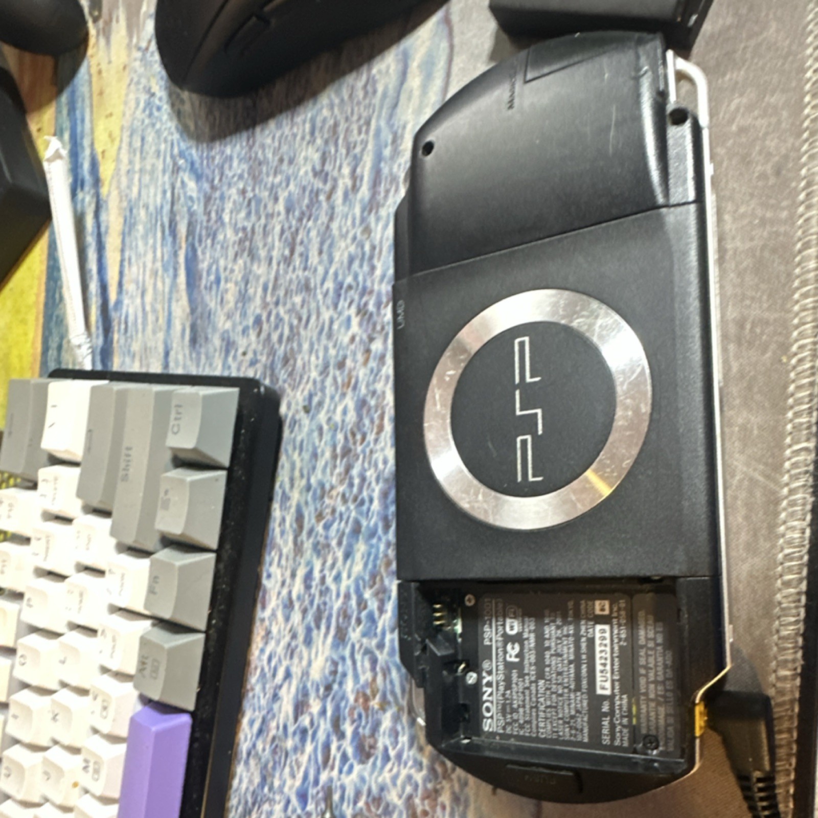 Sony PSP-1001 Handheld with charger and 2 batteries working READ