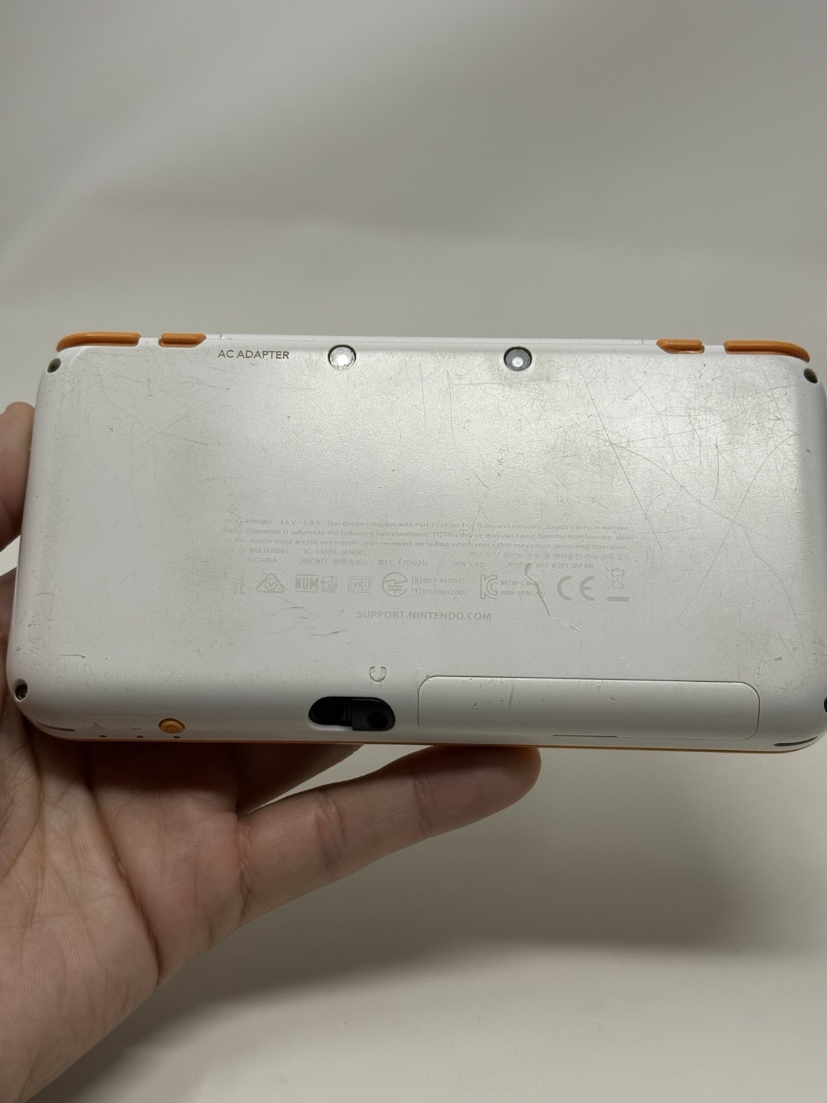 New Nintendo 2DS XL Orange White Handheld USA System w Charger Stylus and Extras