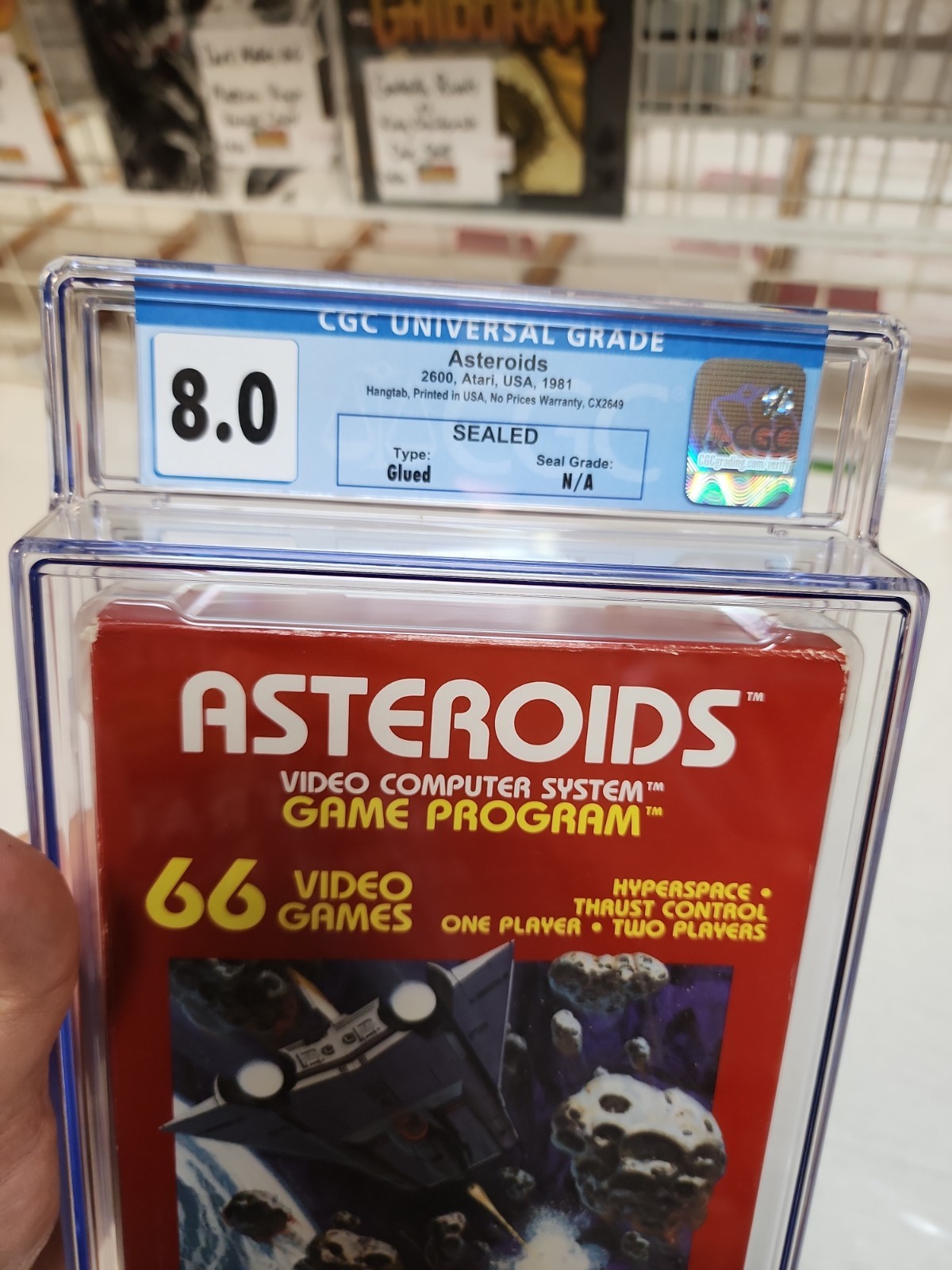 1981 Atari 2600 Asteroids CGC 8.0 Hangtab Version