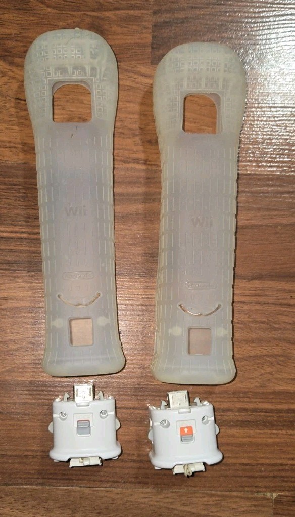 2 Official Genuine Nintendo Wii Motion Plus Adapters for Sports Resort w Sleeves