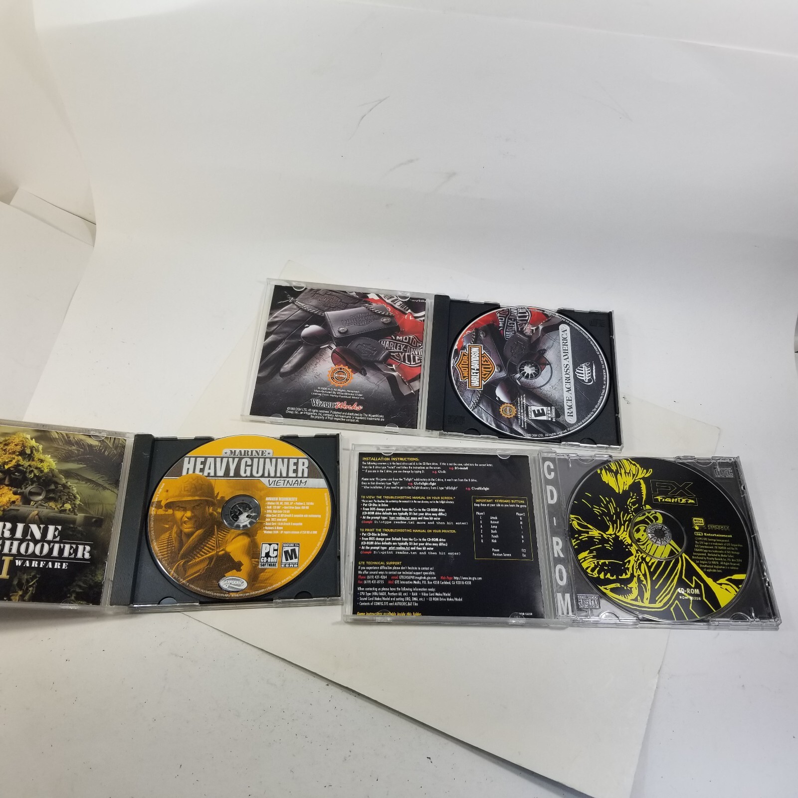 Lot of 3x Games Harley Race Across America, Marine Heavy Gunner, FX Fighter (PC)