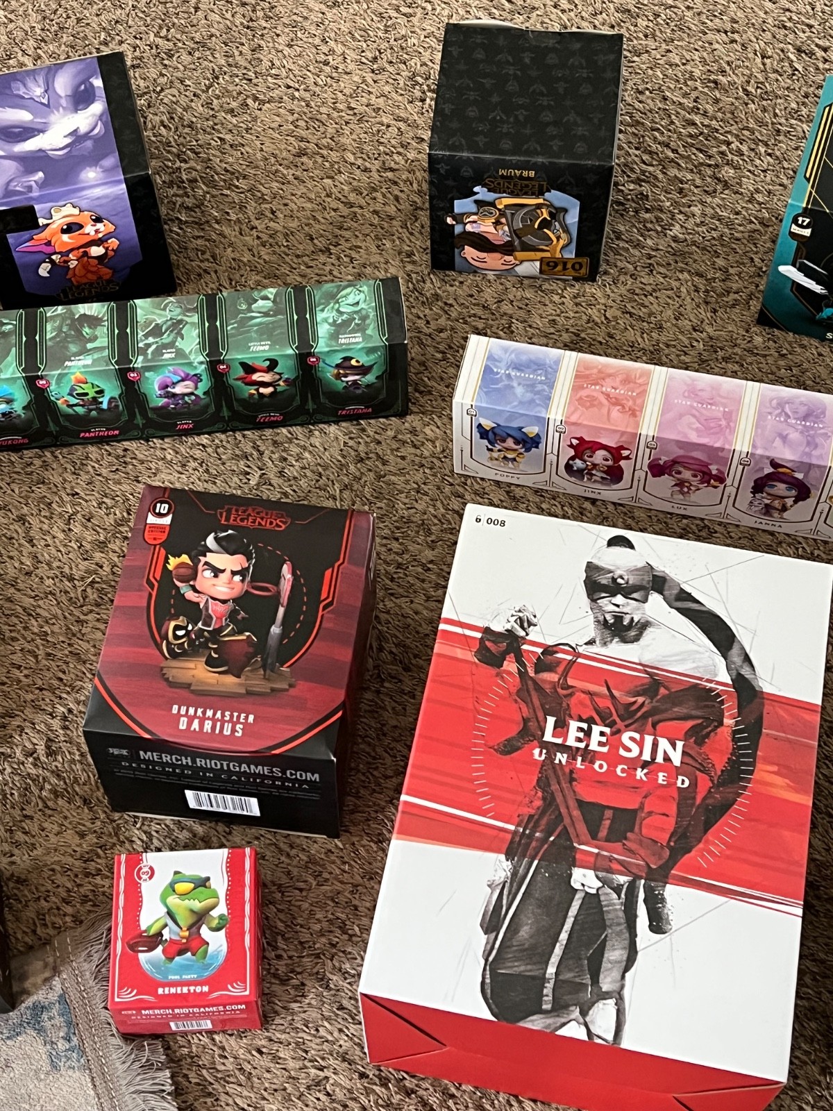 huge lot of league of legends statues