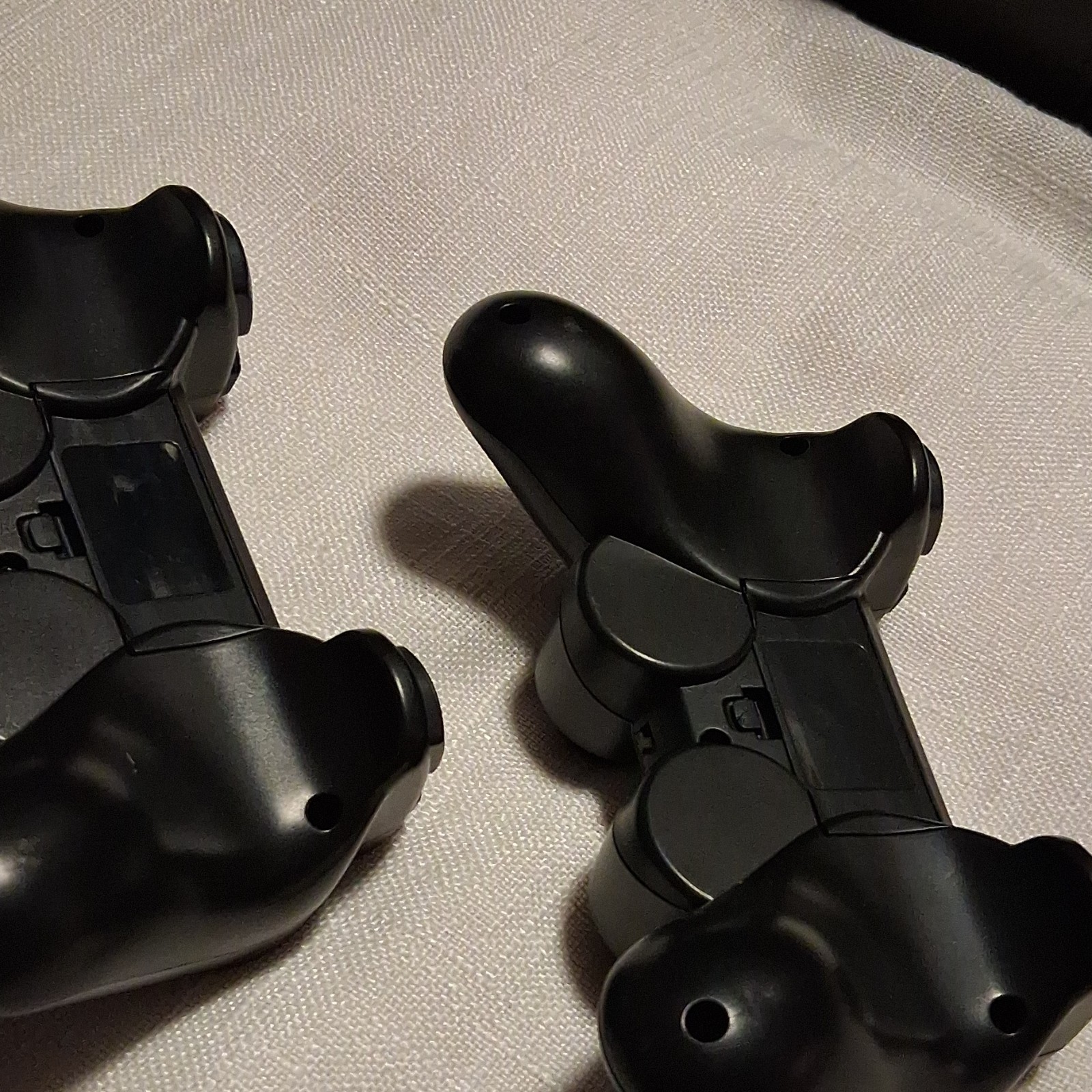 Lot of 2 Black Video Game Controllers with Dual Joysticks and XYAB Buttons