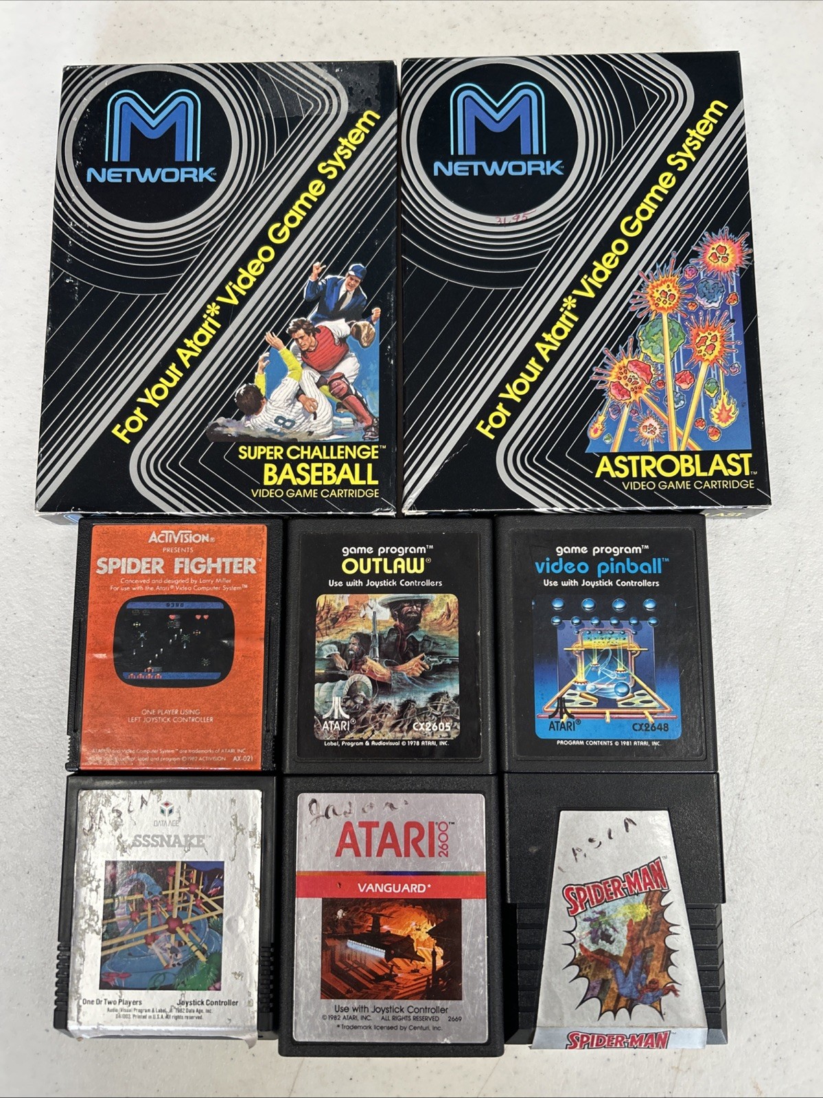 Lot Of 8 Atari 2600 Video Games Vintage Spider-Man Astroblast Sssnake Outlaw