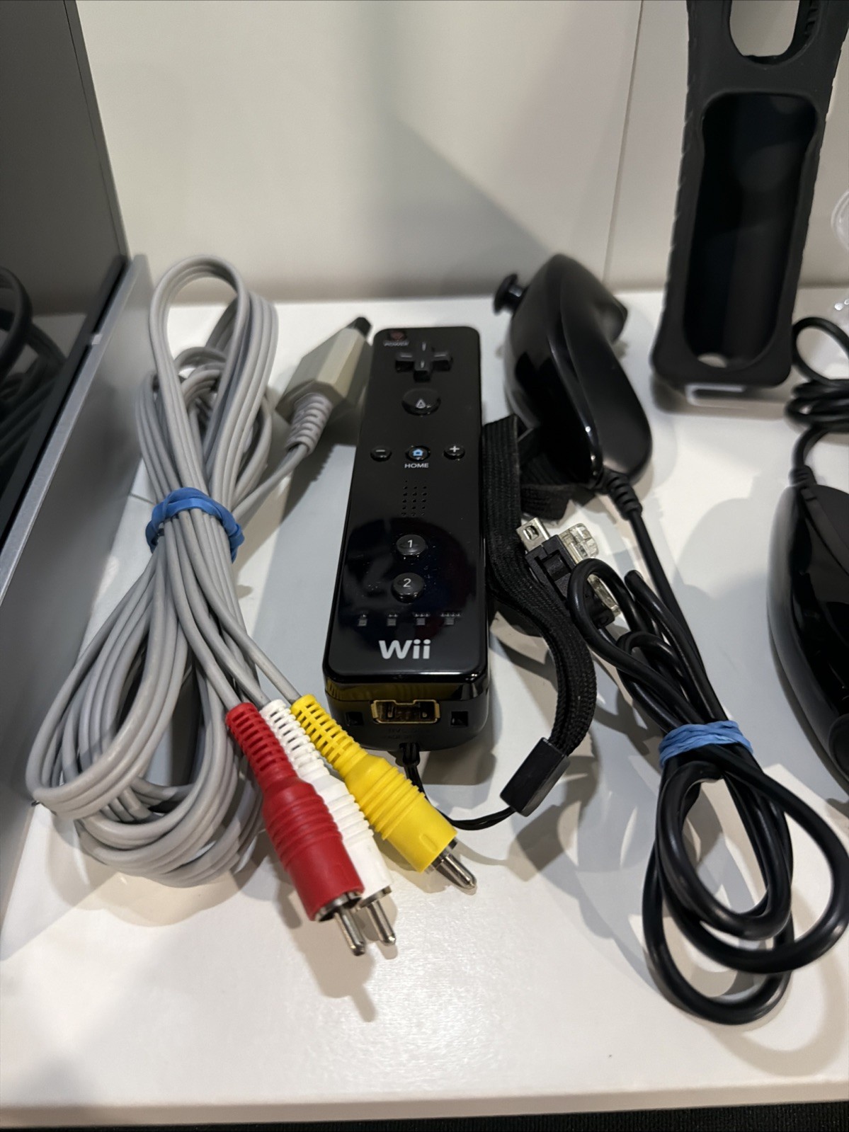 Nintendo Wii RVL-101(USA) Console Bundle – Black (2 Sets Of Controllers & Game)