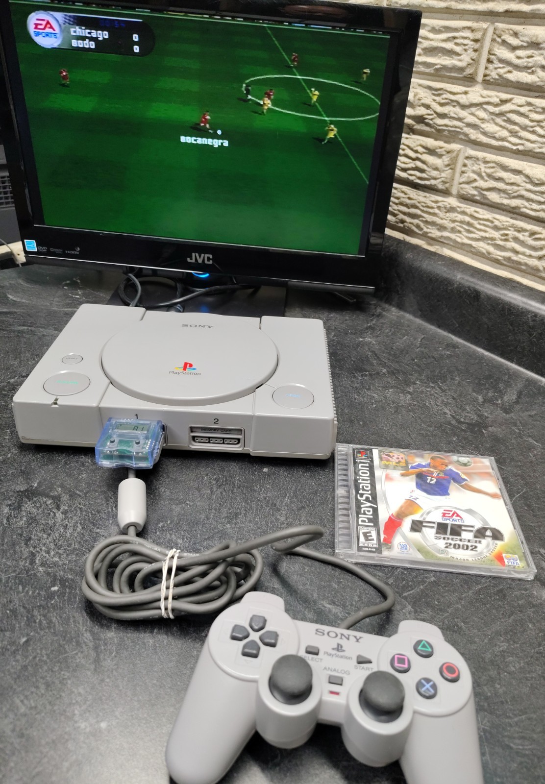 Sony PlayStation 1 SCPH-7501 W/ 2 Games 1 Controller Cables Mega Mem Card Tested