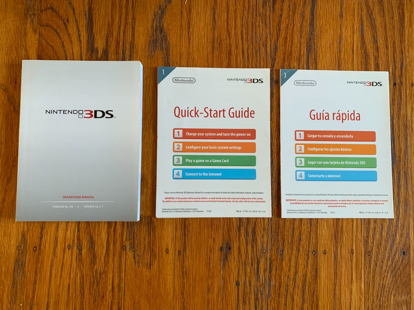 Lot of 2 Nintendo 3DS Cosmo Black and Flame Red console boxes and manuals only