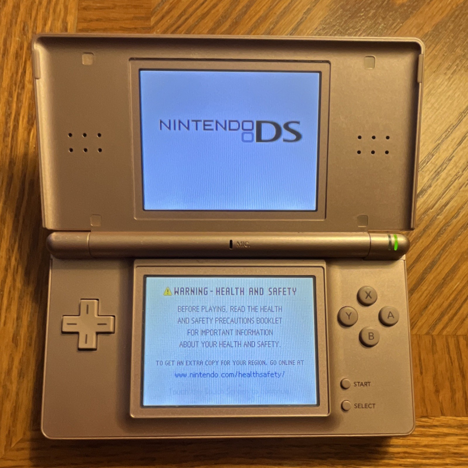 Nintendo DS Lite Pink Handheld Console w/ Stylus, Charger, GBA Slot Cover WORKS