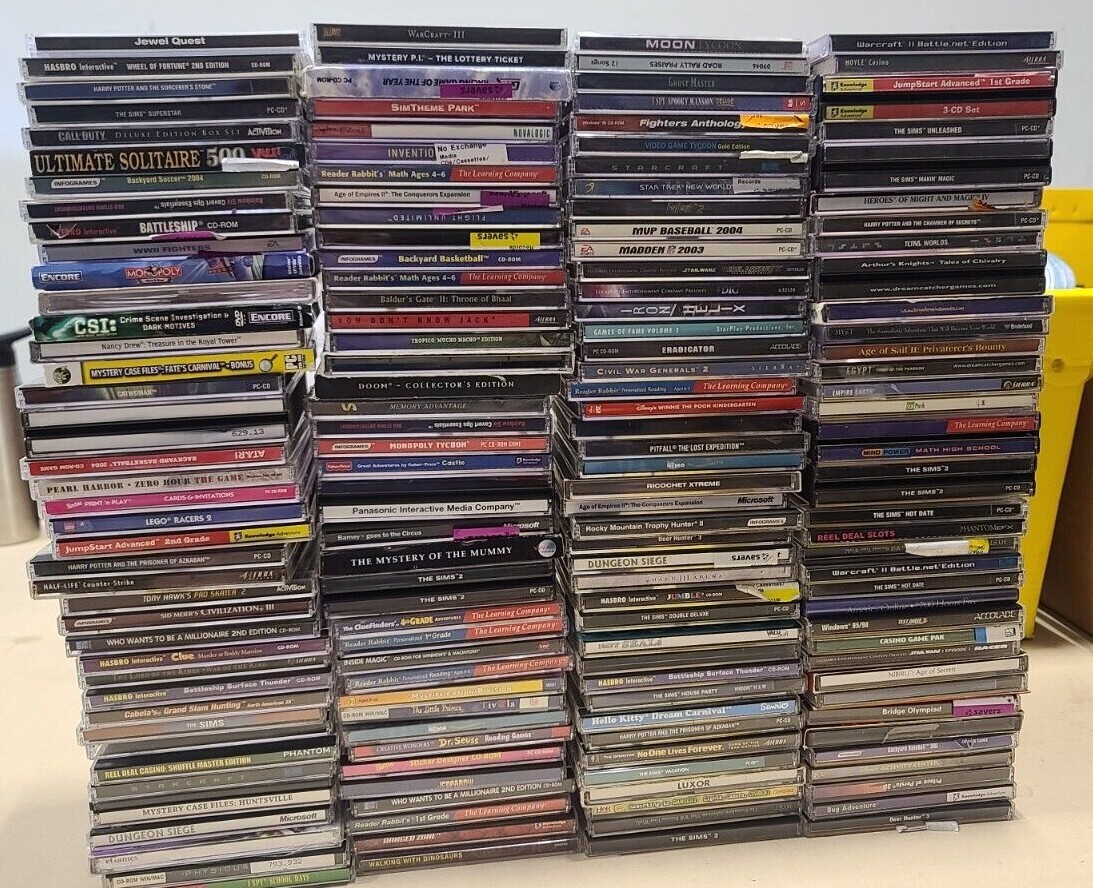 Huge PC Games and Softwares Lot about 80 Discs Free Shipping Random Assorted