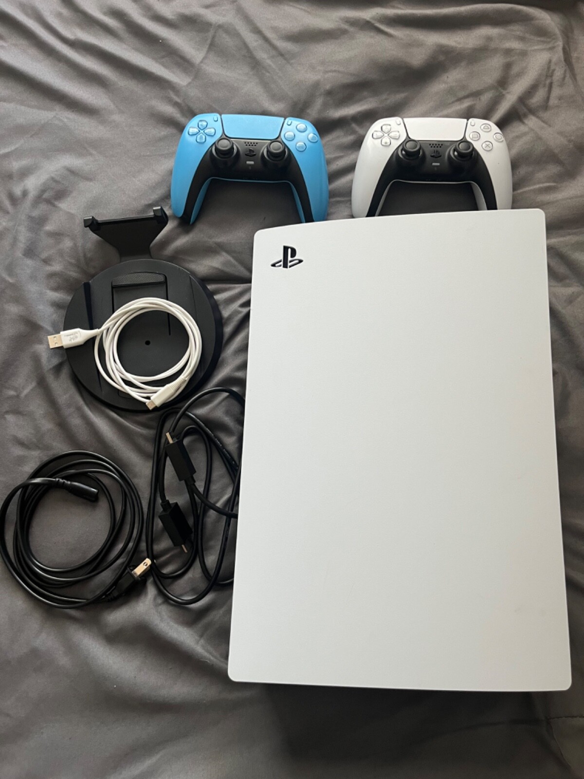 Ps5 console w/ 2 controllers & 6 ft charger. Blu-Ray Disc Player.