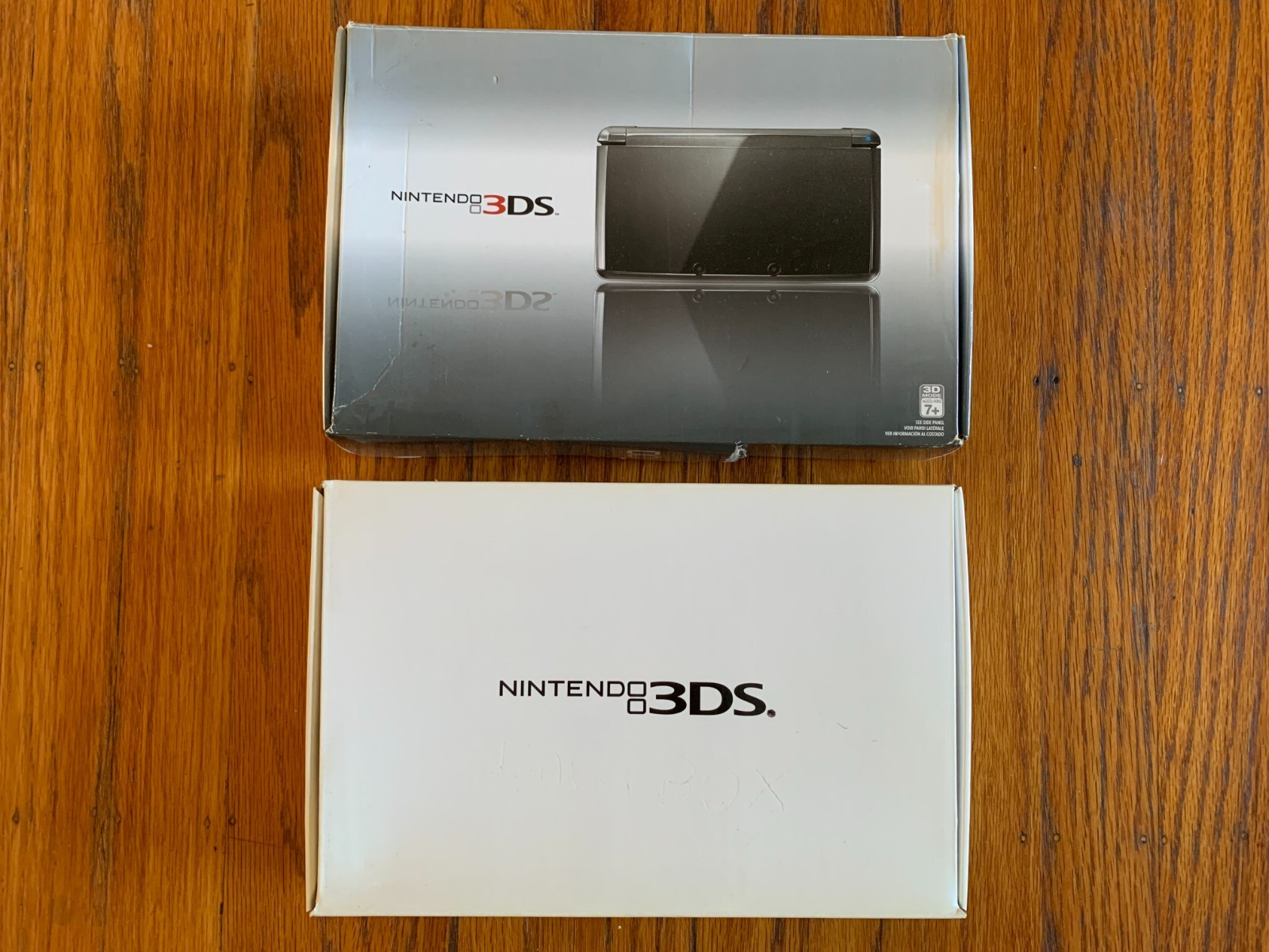 Lot of 2 Nintendo 3DS Cosmo Black and Flame Red console boxes and manuals only