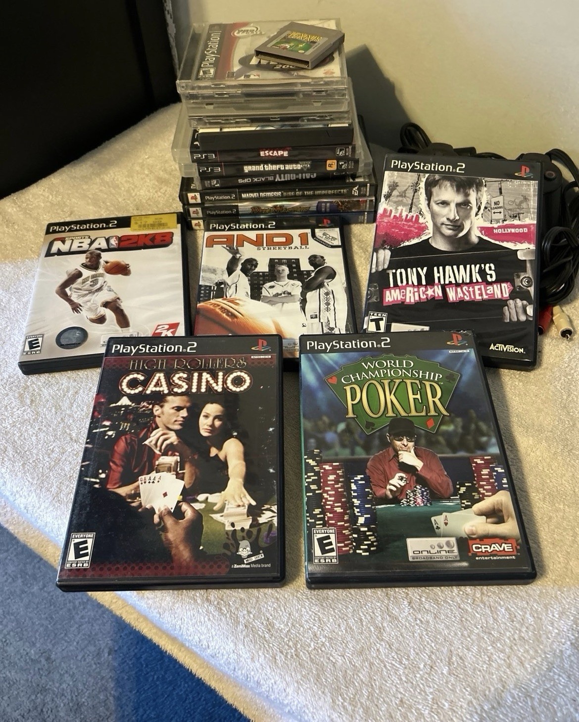 PlayStation 1, 2, & 3 Game lot. 19 total games & PS2 wired controller. Used