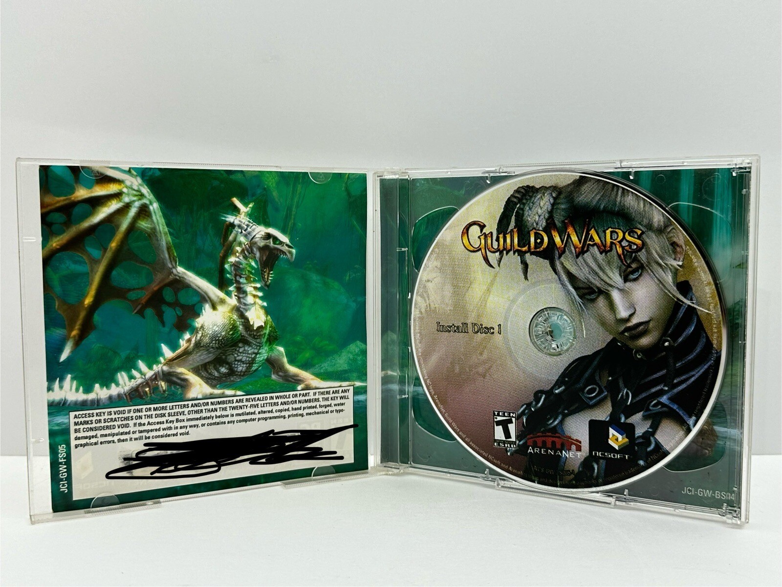 Guild Wars (PC CD ROM, 2005) Complete 2 Discs NCSOFT MMORPG Computer Game