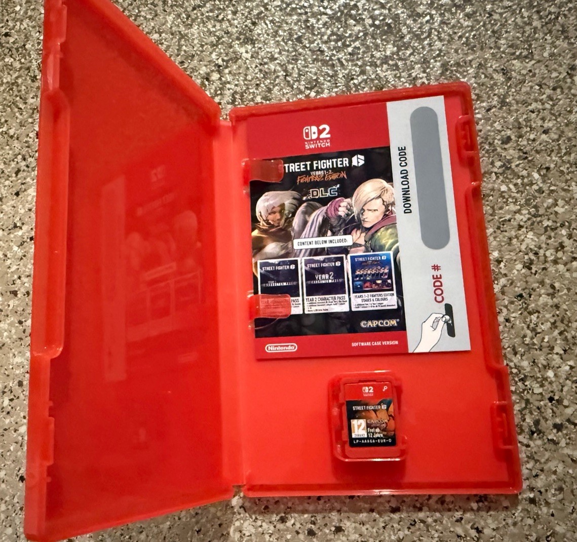 Street Fighter 6: Year 1-2 Fighters Edition (Switch 2) LIKE NEW WITH DLC CODE