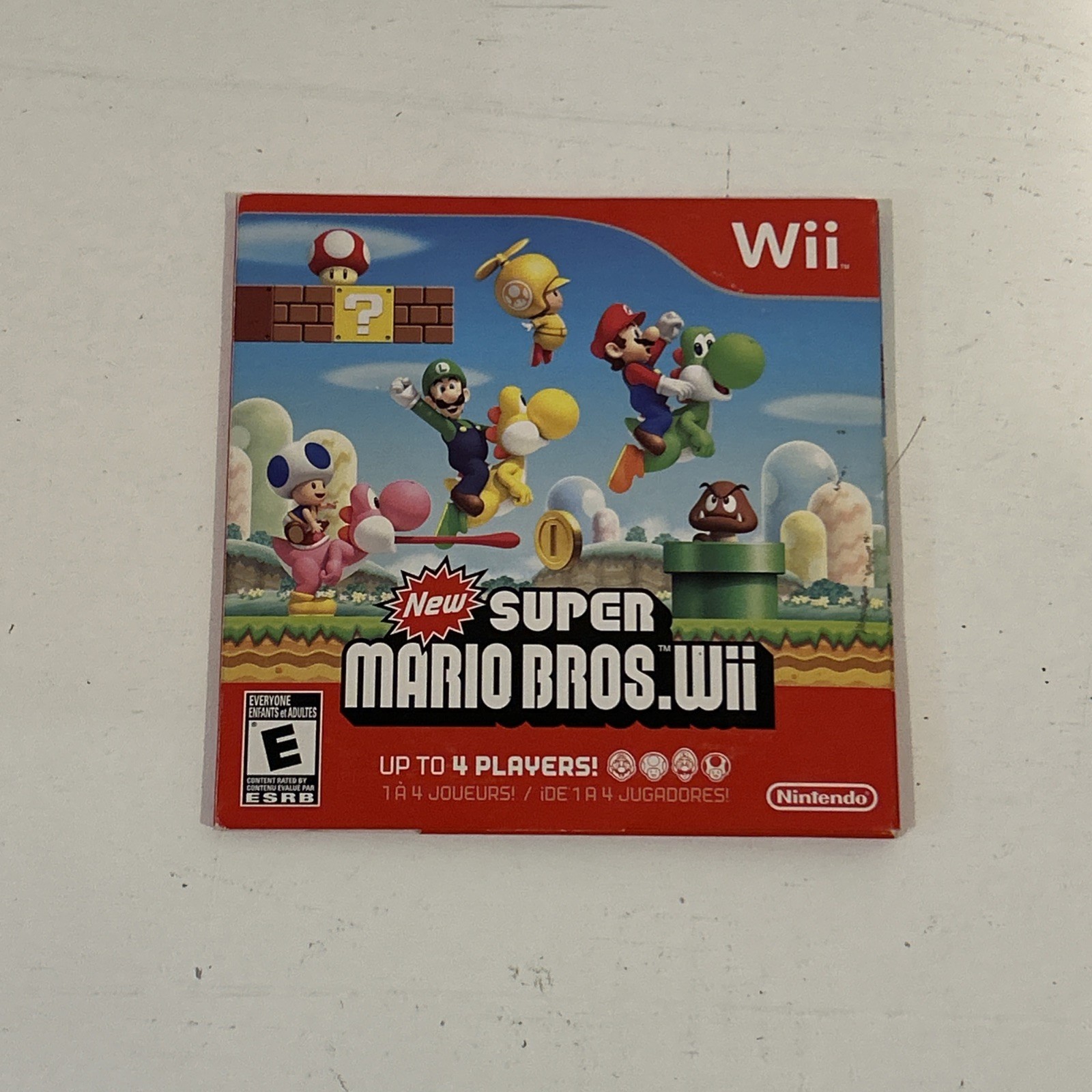New Super Mario Bros. Wii (Game + Cardboard Sleeve)