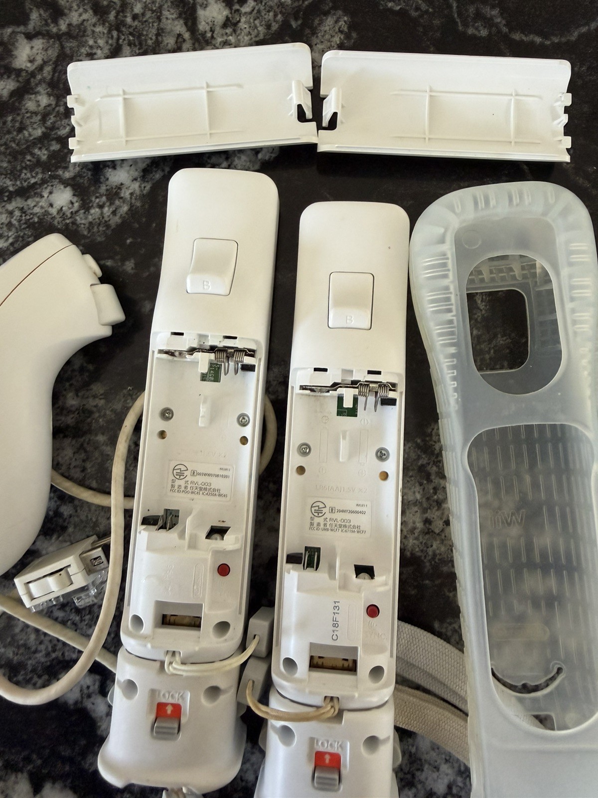 Nintendo Wii White Remote with Motion Plus Adapter and Sleeve and Nunchuck x2