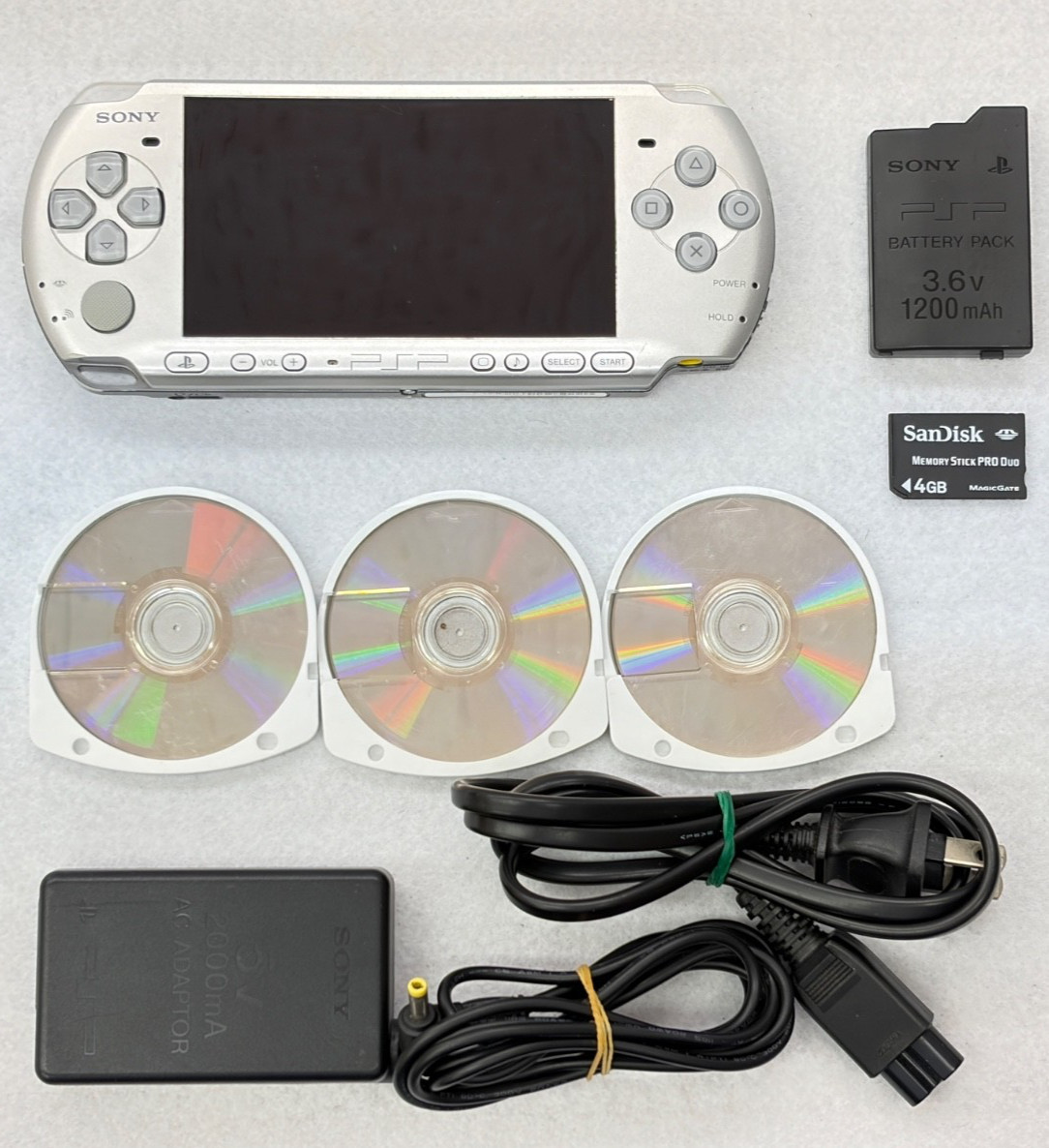 TESTED SONY PSP 3000 Mythic SILVER Console + Charger + battery + 3 game 4GB
