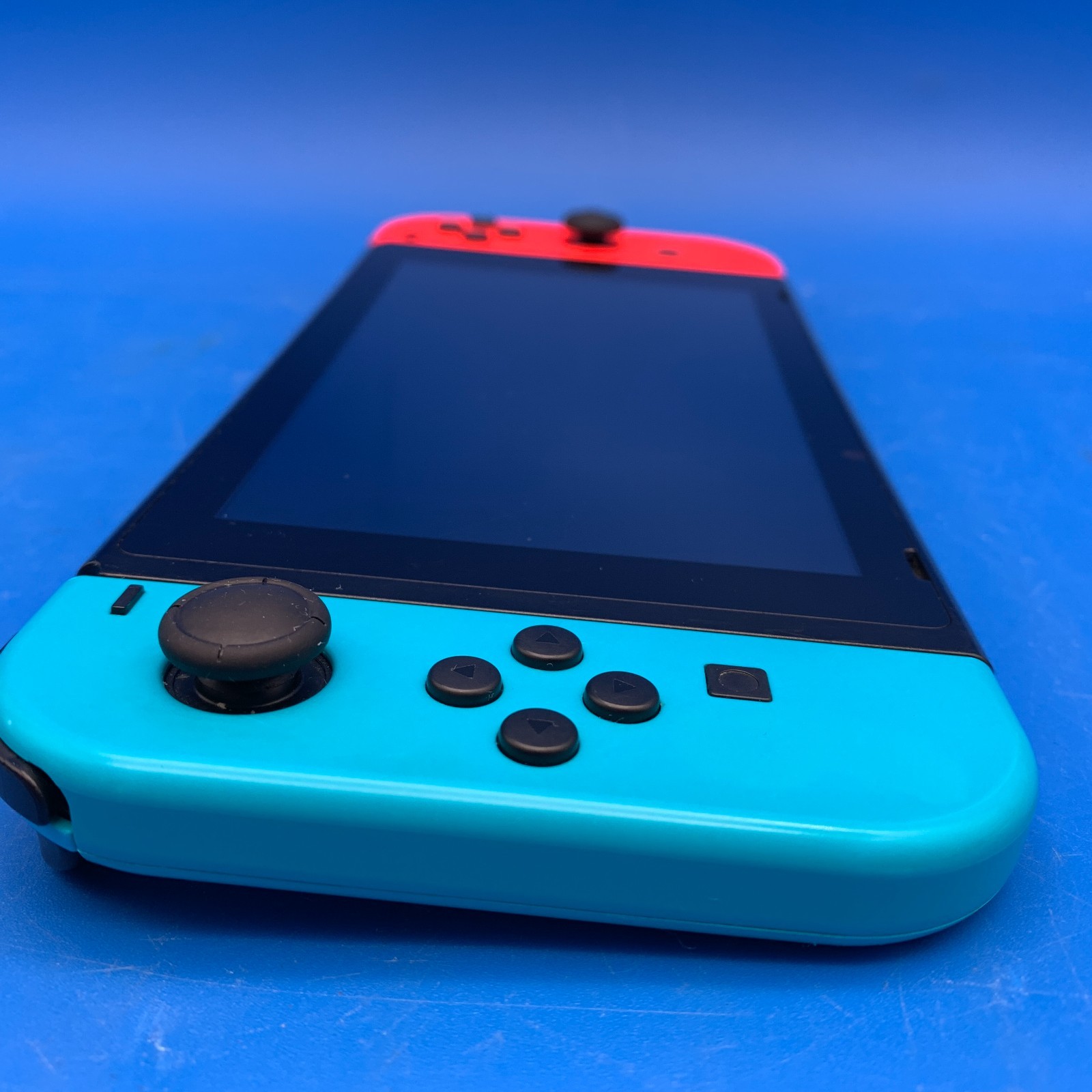 Nintendo Switch HAC-001(-01) 32GB Handheld Console w/ Red/Blue Joy-Cons + Case