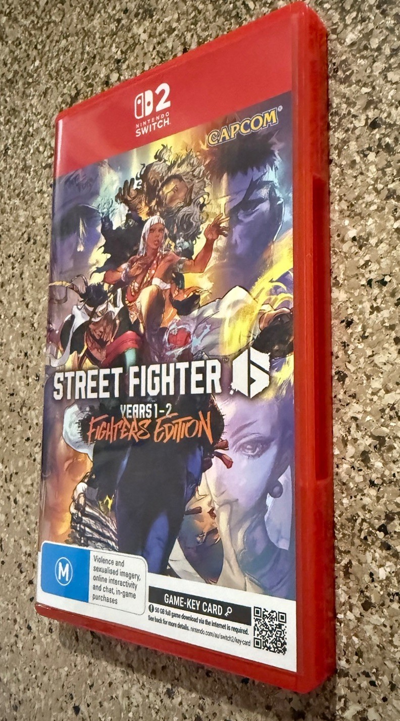 Street Fighter 6: Year 1-2 Fighters Edition (Switch 2) LIKE NEW WITH DLC CODE