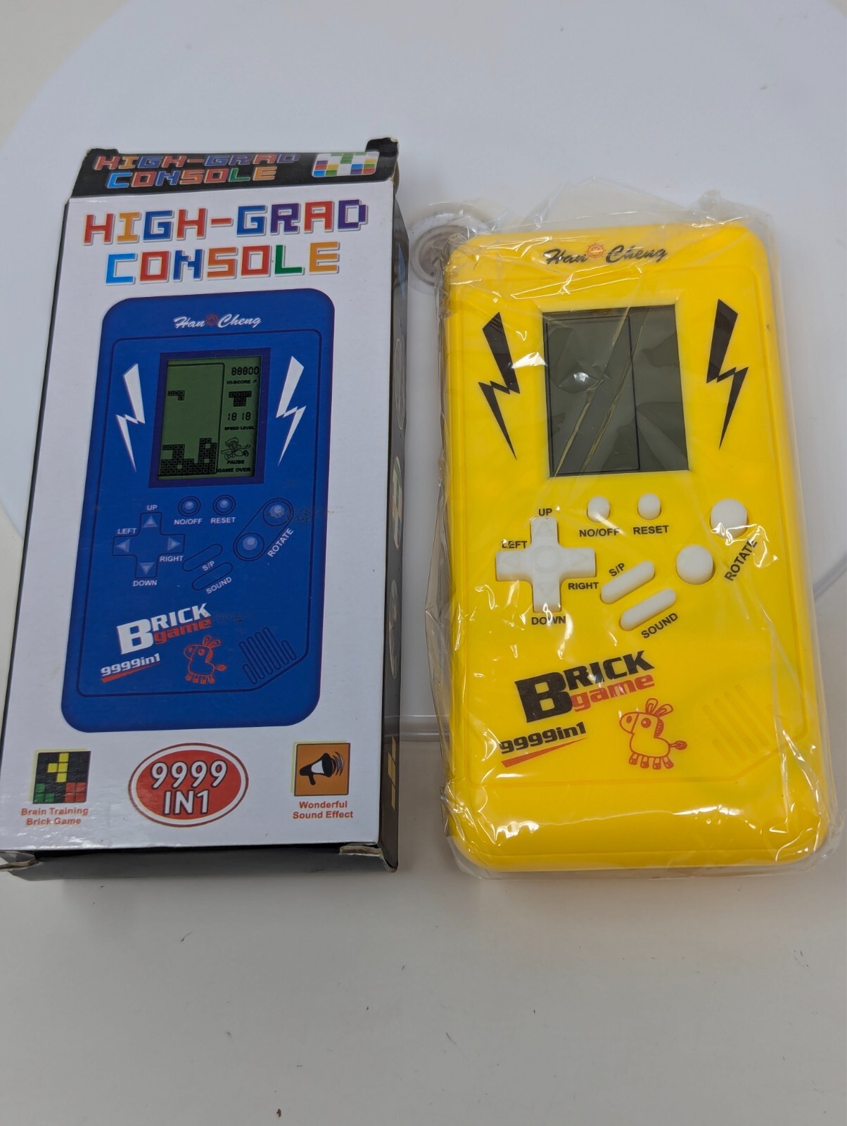 New Han Cheng 9999 in 1 Video Games Console Yellow Brick Game Puzzle Handheld