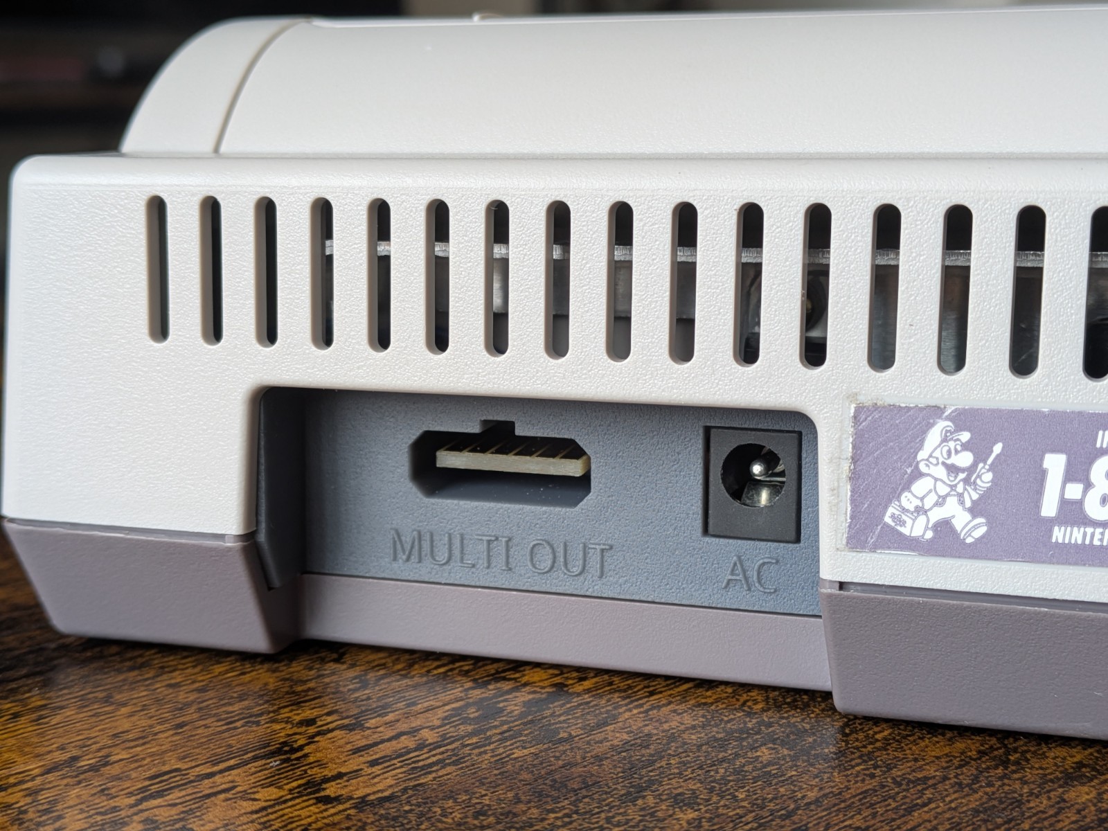 Multi-out panel with connectors for Nintendo NES-101 Top Loader gaming console