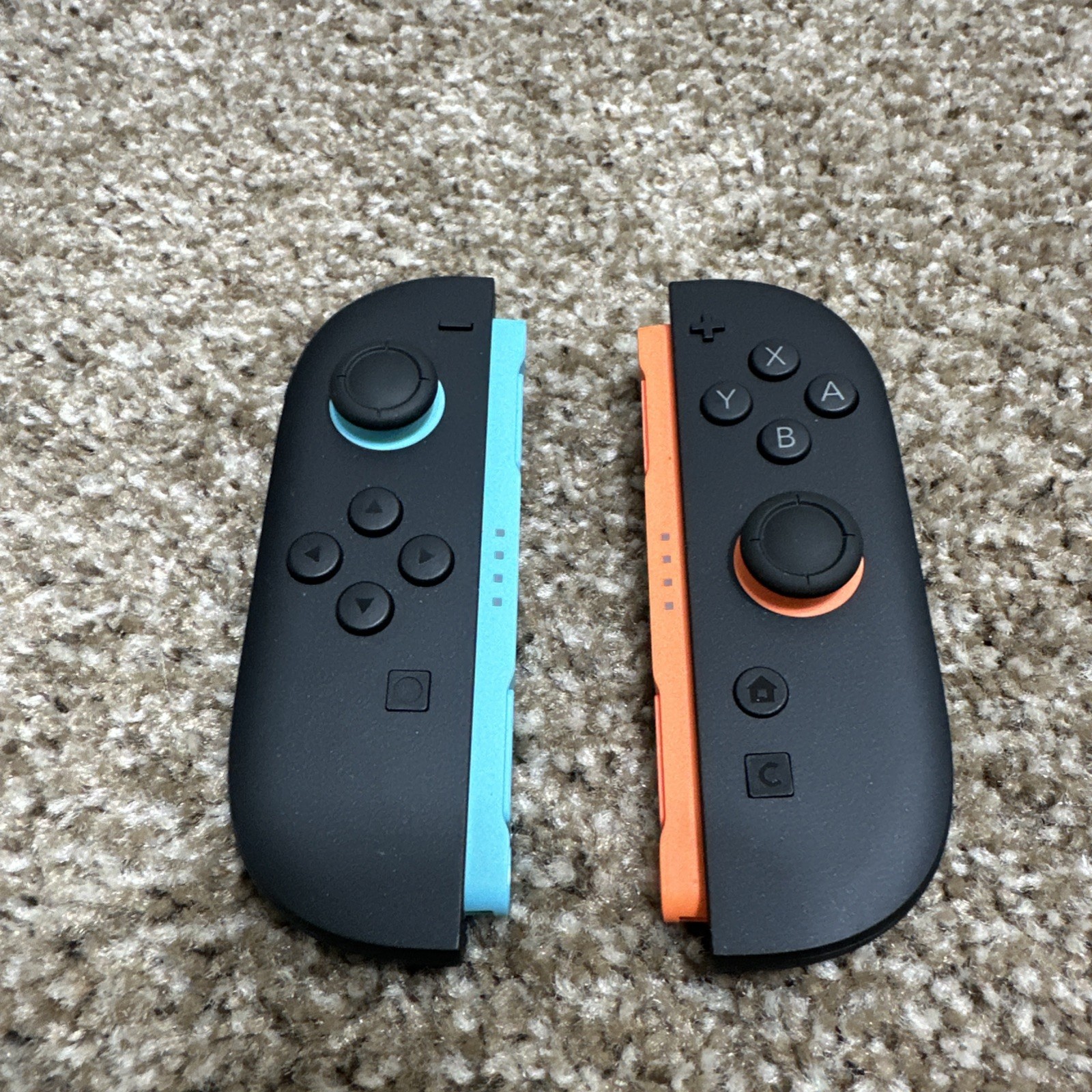 Official Nintendo Switch 2 Joy-Con Blue/Red With 2 Handheld Attachments