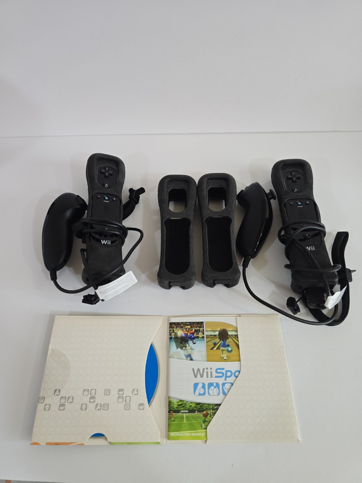 Nintendo Wii 2-Player Controller Bundle Black Remotes Nunchucks Wii Sports Nyko