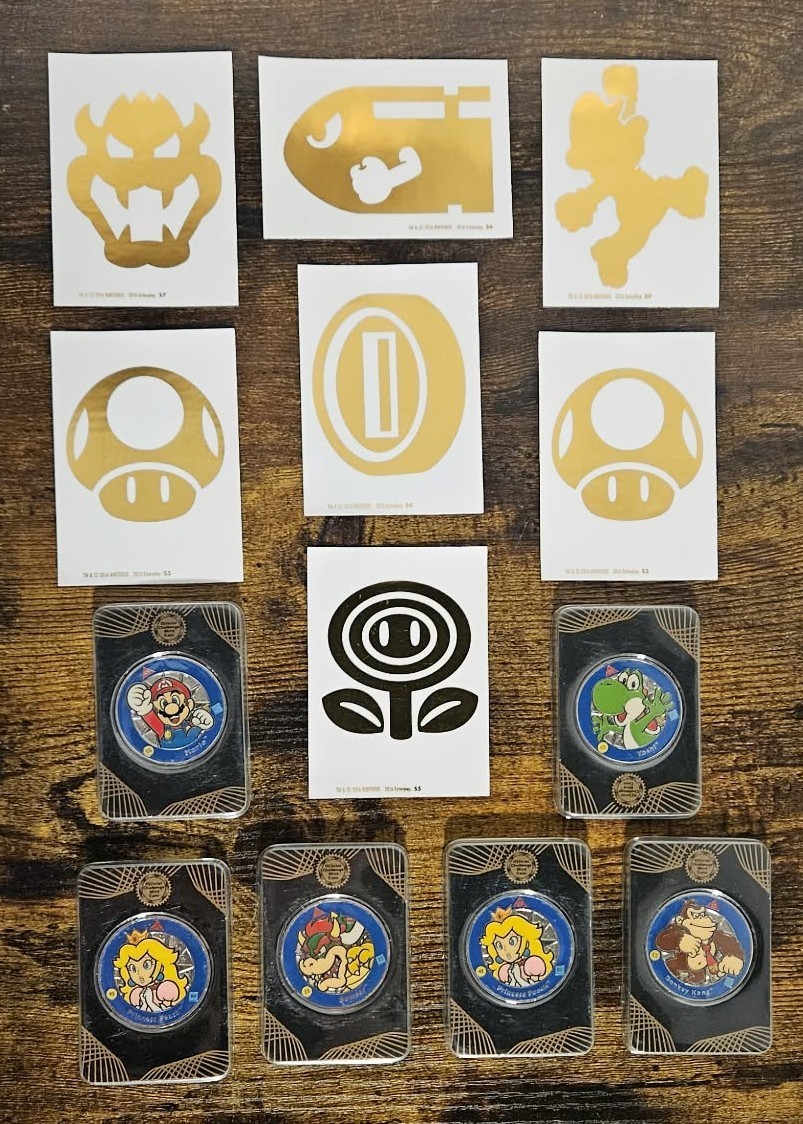 Vtg Super Mario Challenge Coin Lot – 6 Silver Colored Challenge Coins & 7 Decals