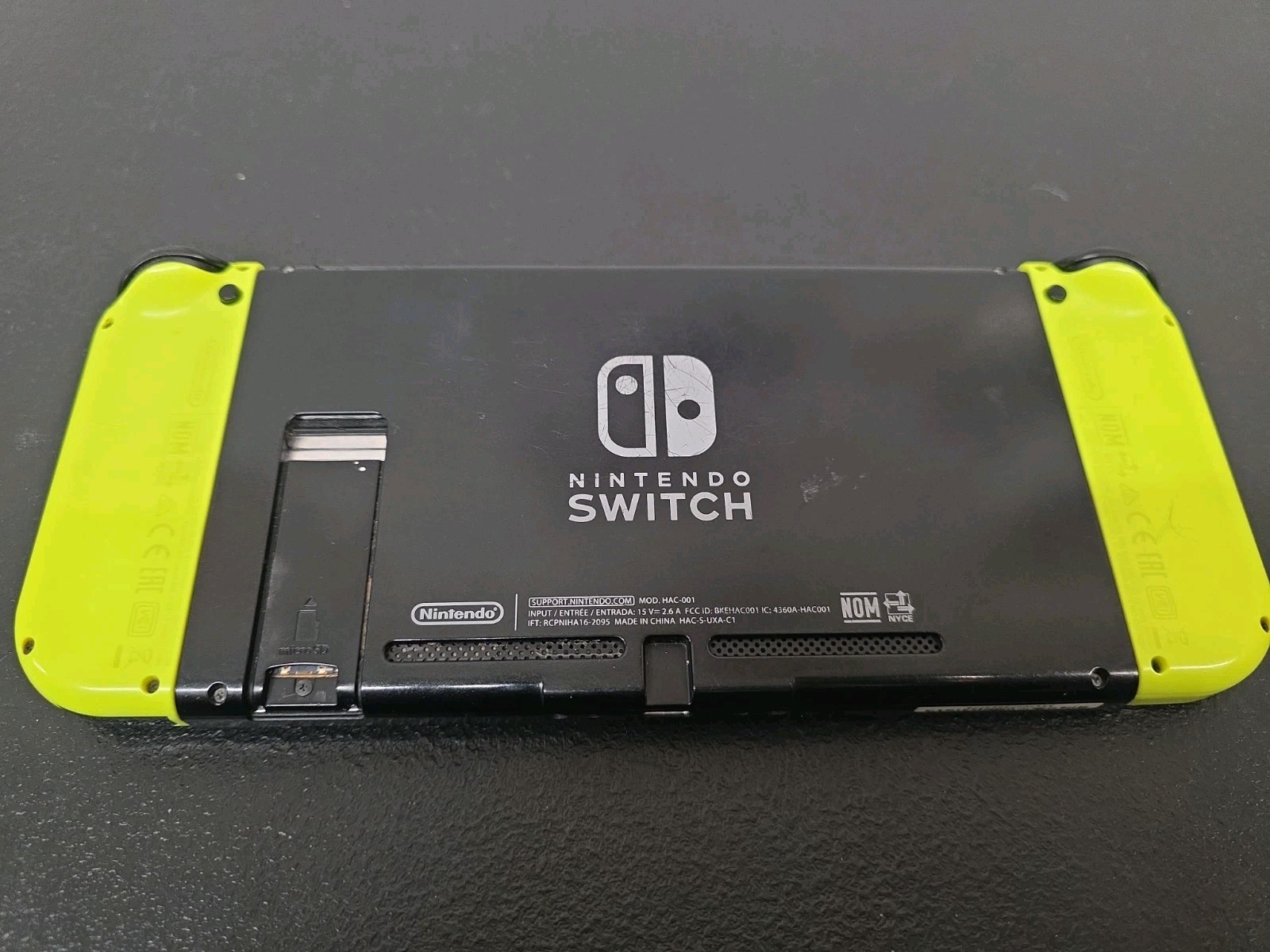 Nintendo HAC00101 Handheld System – Black & Neon Yellow Joy Cons! Gen. 1. BN18