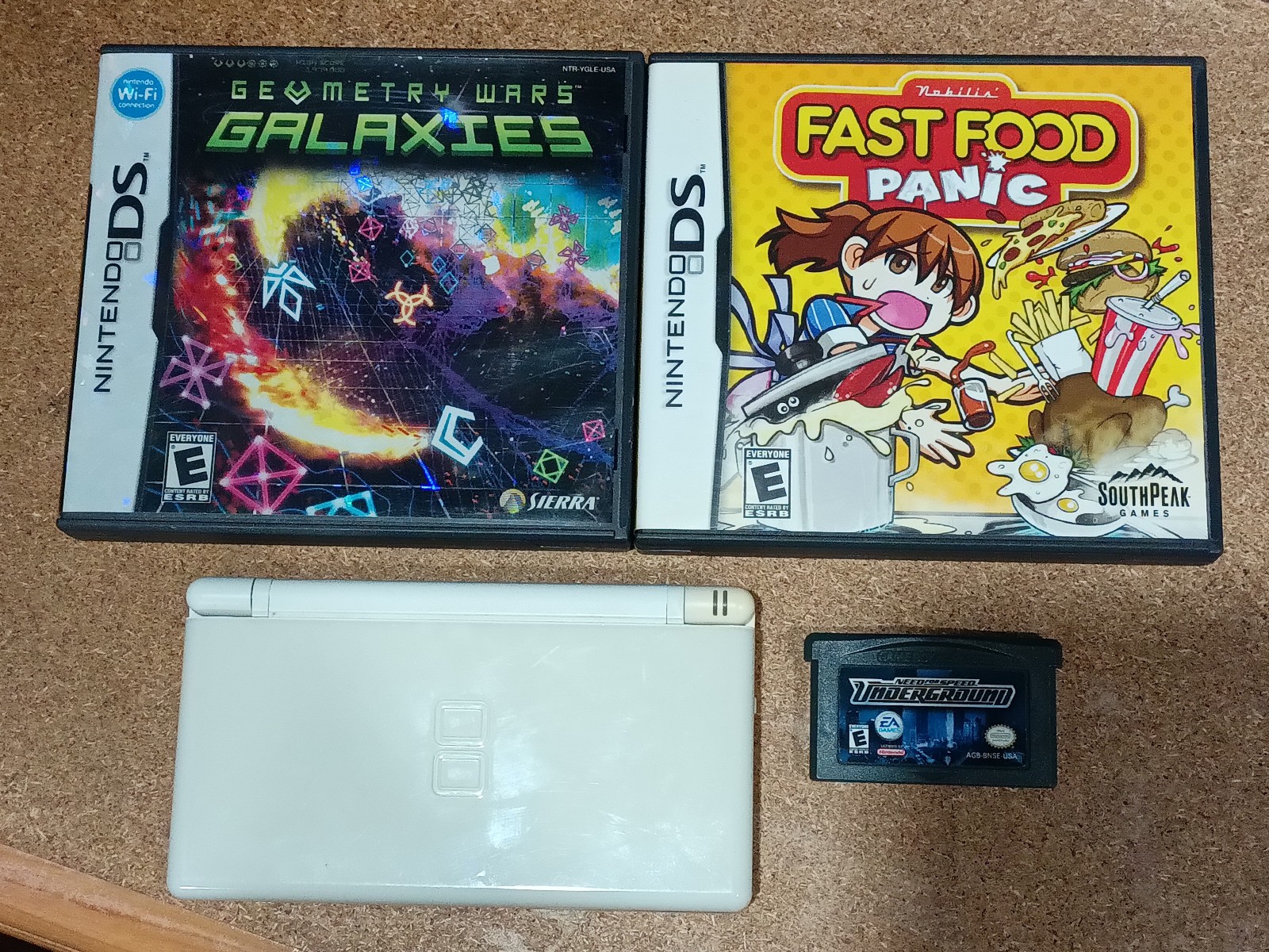Nintendo DS Lite Handheld System White – 2 DS Games 1 GBA Game