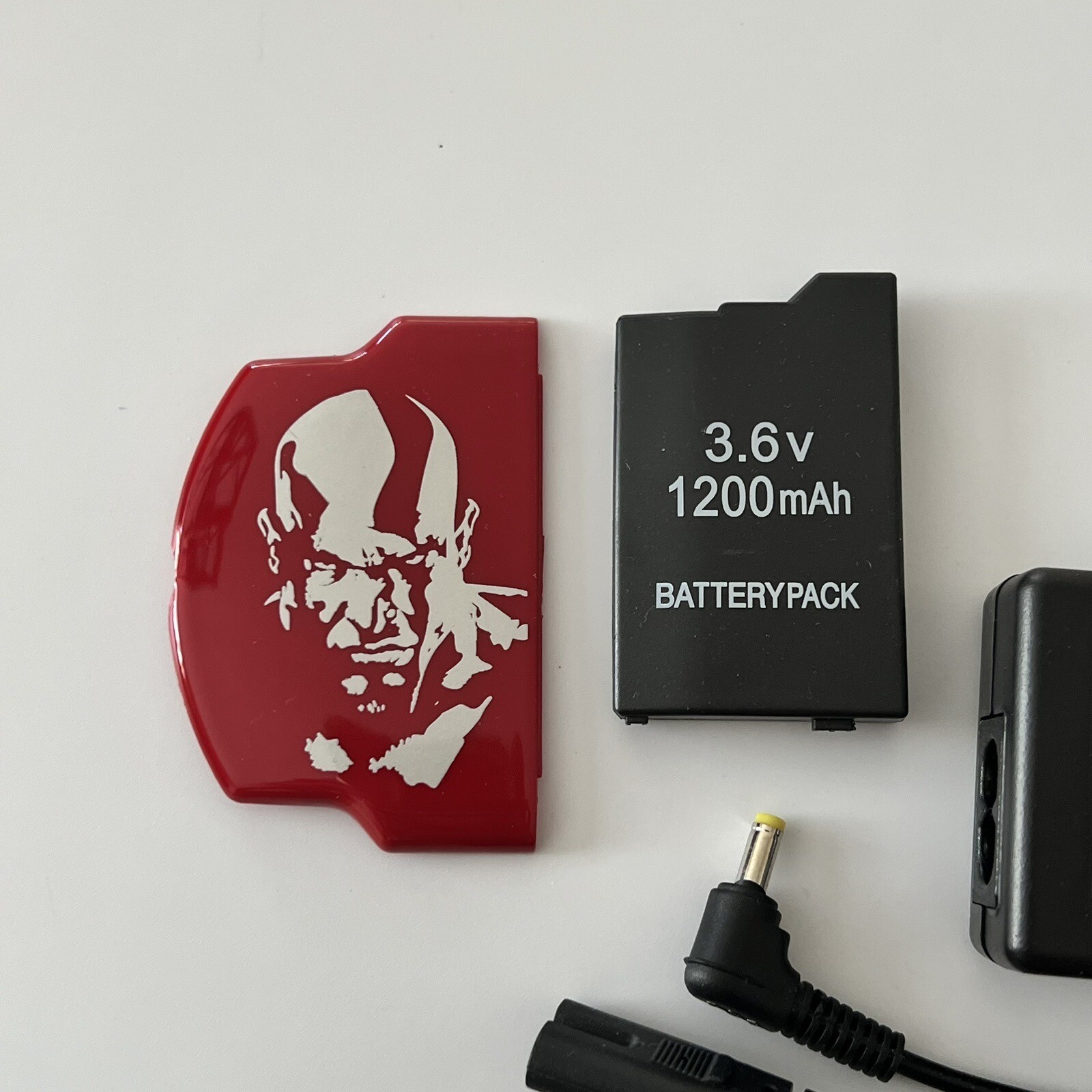 QUALITY PSP 2000 Kit – Battery, Charger, God Of War Cover, 64gb Memory Card