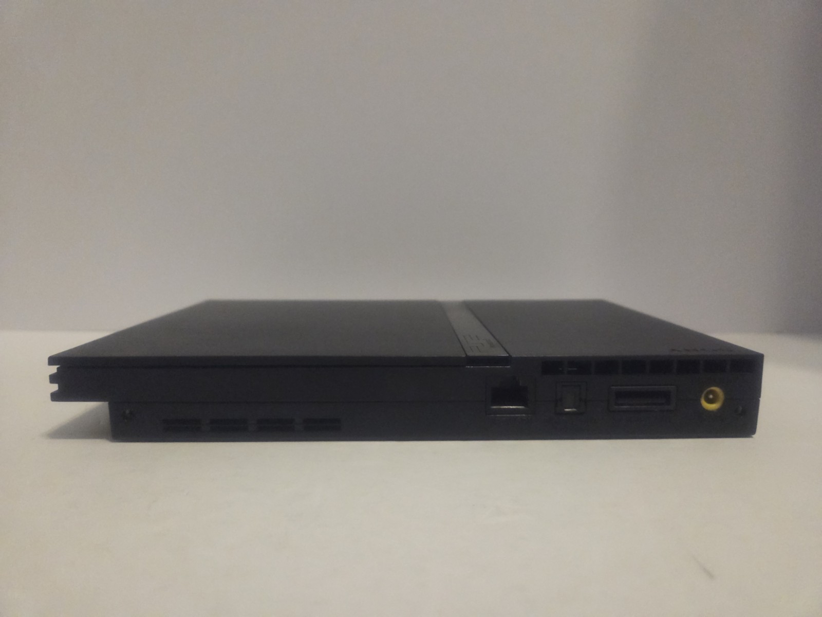 Sony PlayStation 2 Slim SCPH-70001 NTSC-U/C Bundle w/ Controller, Cables, Games