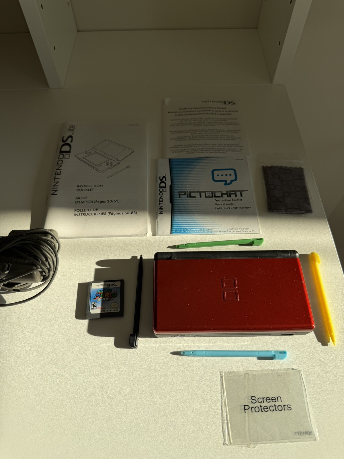 Nintendo DS Lite | Crimson Red/Black | Charger | Manual | Super Mario 64 DS